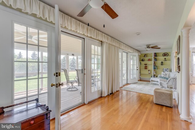 1629 Pondview Dr, Winchester, VA 22601 - doorway with ceiling fan, light wood-style flooring, french doors, ornate columns, and built in features