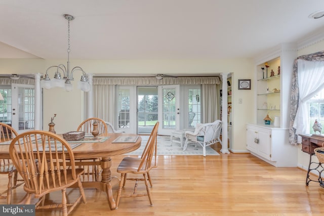 1629 Pondview Dr, Winchester, VA 22601 - dining area featuring light wood-type flooring and a chandelier