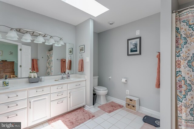 1629 Pondview Dr, Winchester, VA 22601 - bathroom featuring double vanity, a skylight, tile patterned flooring, and a shower with shower curtain