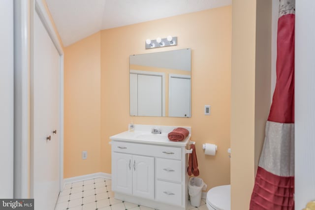 1629 Pondview Dr, Winchester, VA 22601 - bathroom featuring vanity, vaulted ceiling, and tile patterned floors