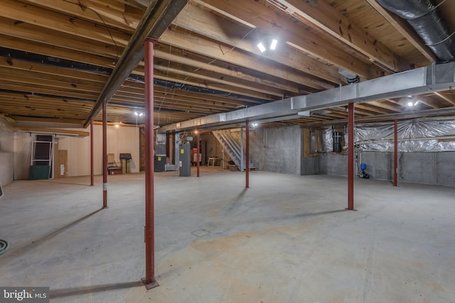1629 Pondview Dr, Winchester, VA 22601 - unfinished basement featuring stairway and electric water heater