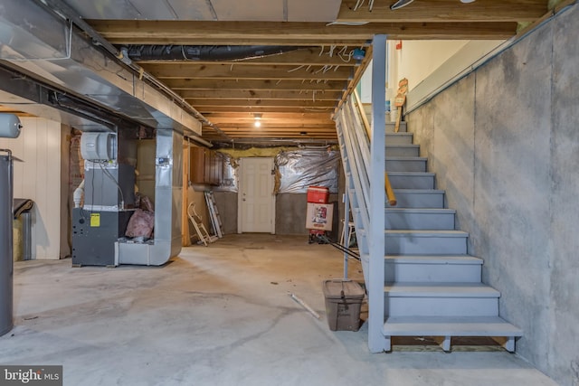 1629 Pondview Dr, Winchester, VA 22601 - unfinished below grade area featuring heating unit and stairway