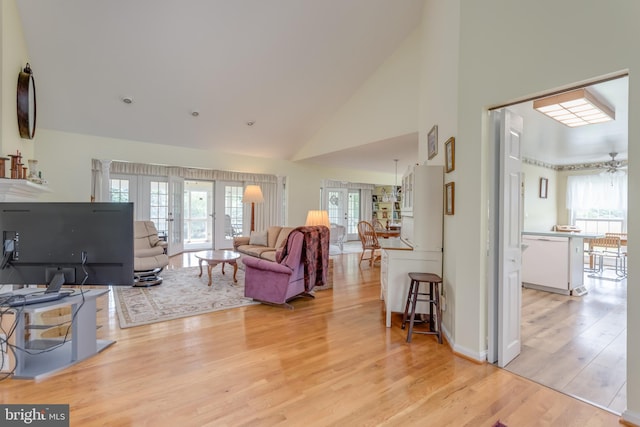 1629 Pondview Dr, Winchester, VA 22601 - living area featuring high vaulted ceiling, light wood finished floors, and ceiling fan