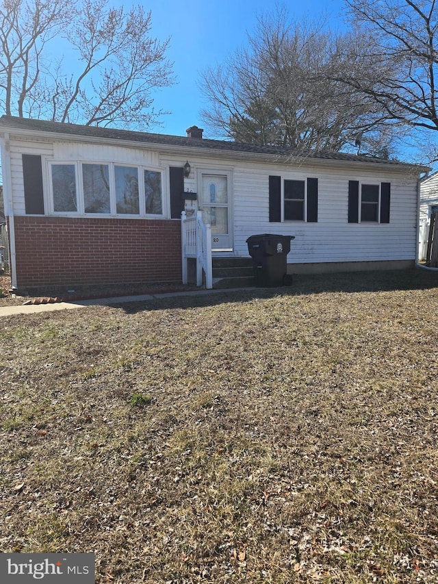 view of front facade with brick siding