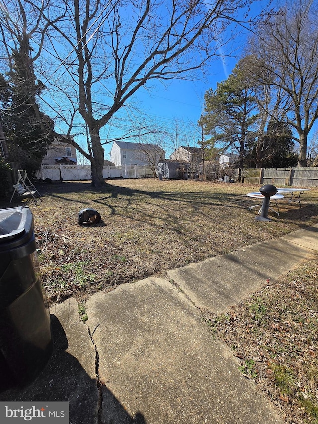 view of yard with fence