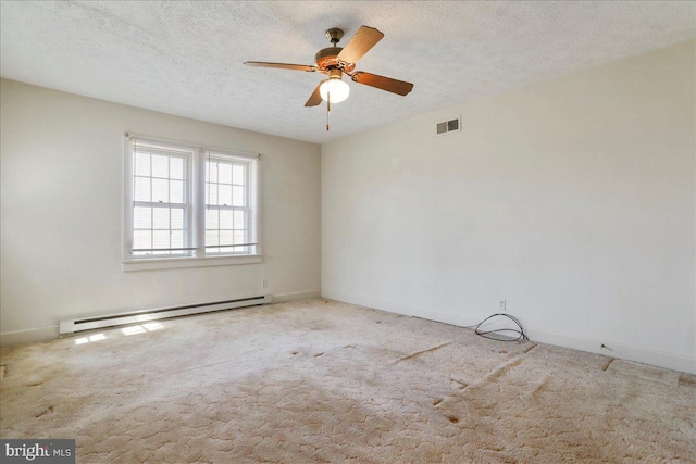 spare room with carpet, visible vents, ceiling fan, a textured ceiling, and baseboard heating