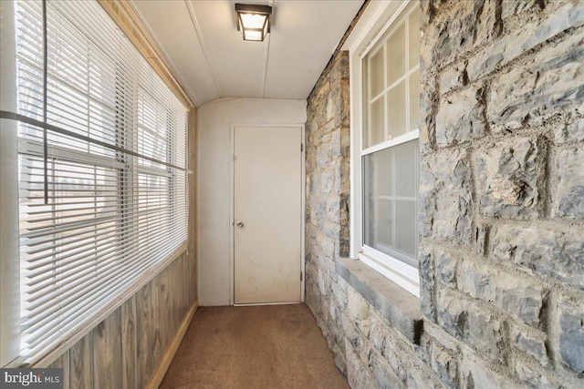 hallway with carpet