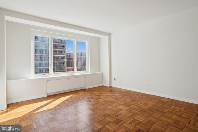 2475 Virginia Ave NW Unit 618, Washington, DC 20037 - spare room with radiator and baseboards