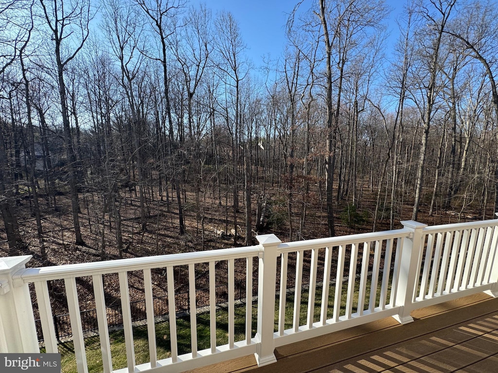 deck with a wooded view