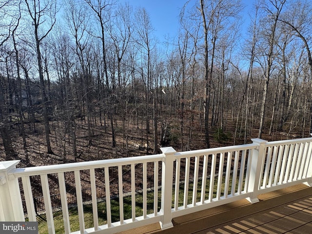 deck with a wooded view