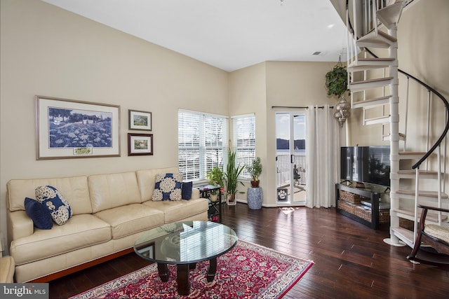 living room with stairway and hardwood / wood-style floors