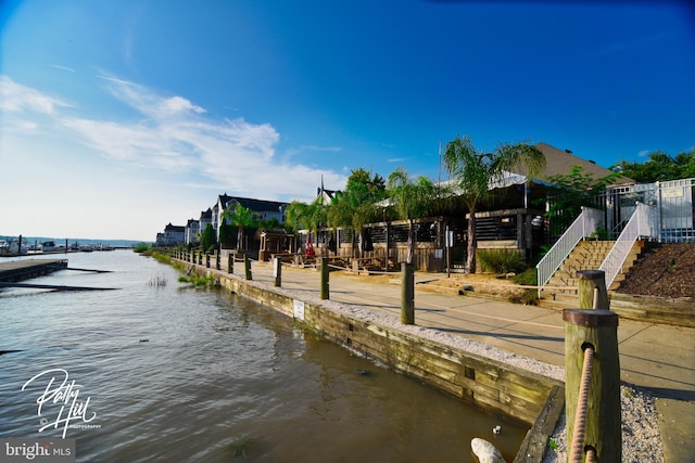 view of dock with a water view