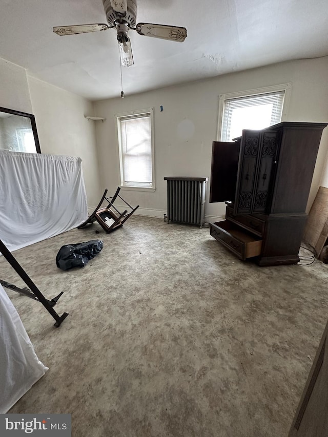 living room with ceiling fan