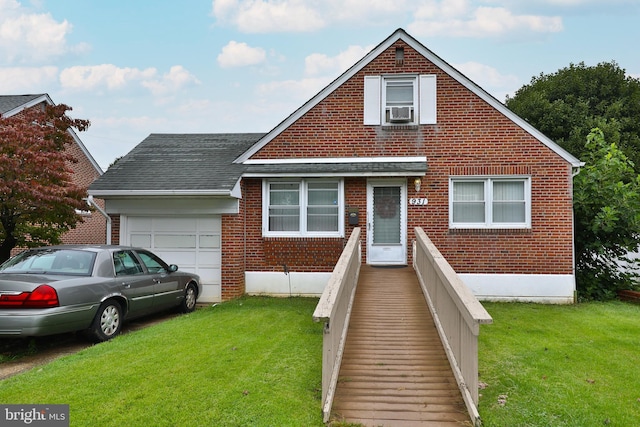 view of front facade with a shingled roof, cooling unit, an attached garage, a front yard, and brick siding