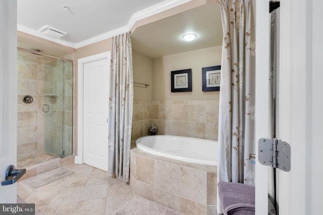 bathroom featuring tile patterned floors, a garden tub, a stall shower, and ornamental molding