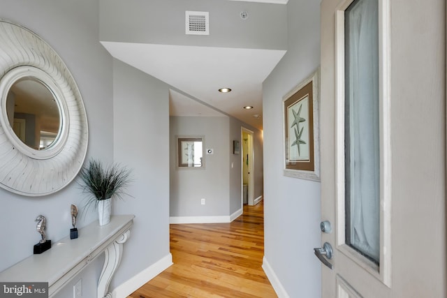 entrance foyer with recessed lighting, visible vents, baseboards, and light wood finished floors