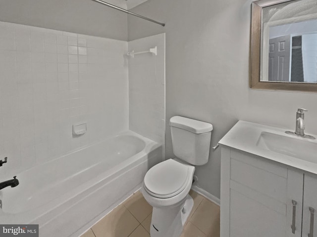 bathroom featuring baseboards, toilet, shower / bath combination, tile patterned floors, and vanity