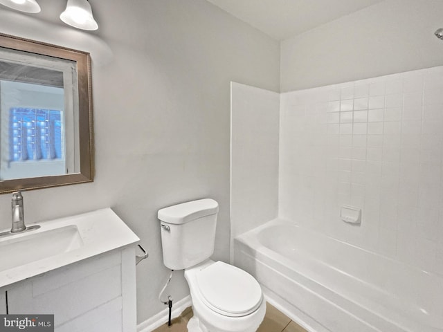 full bathroom with baseboards, toilet, and vanity