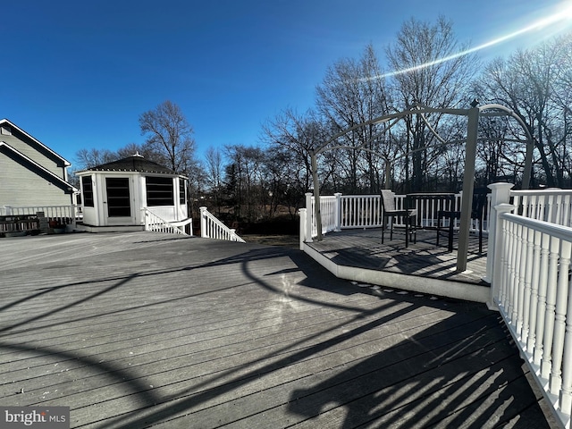 deck with an outdoor structure