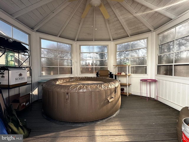 sunroom / solarium featuring wooden ceiling and vaulted ceiling with beams