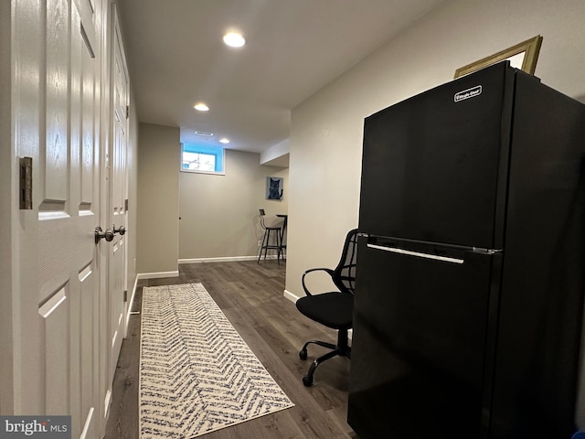 home office featuring recessed lighting, wood finished floors, and baseboards