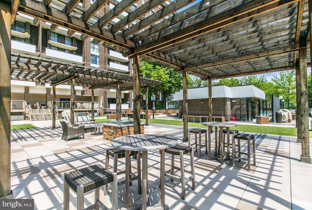 view of patio featuring a pergola