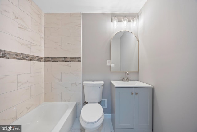 bathroom featuring visible vents, baseboards, toilet, bathing tub / shower combination, and vanity