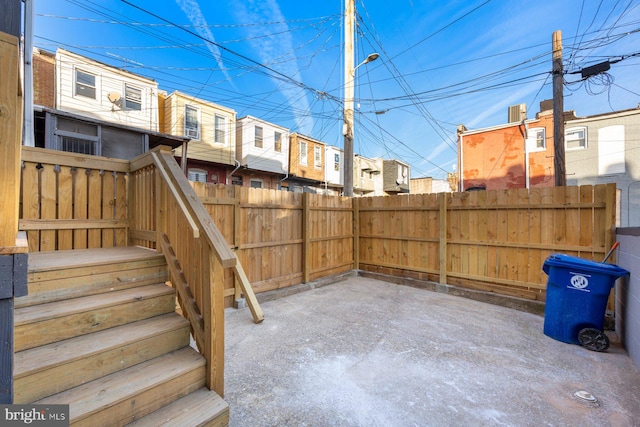 view of patio / terrace featuring fence