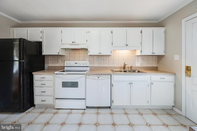 kitchen featuring under cabinet range hood, white appliances, light countertops, and a sink