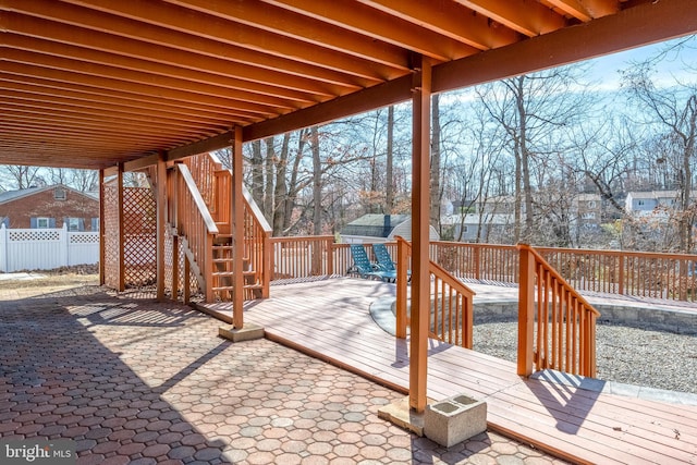 wooden deck featuring stairs and fence