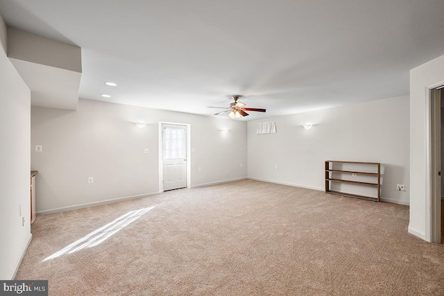 unfurnished room featuring light carpet, recessed lighting, baseboards, and ceiling fan