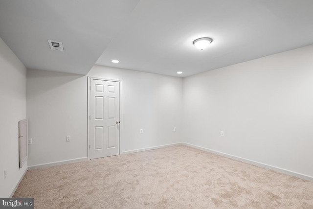 finished basement with recessed lighting, visible vents, carpet floors, and baseboards