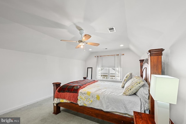 bedroom featuring visible vents, ceiling fan, baseboards, carpet, and lofted ceiling