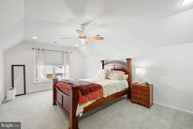 bedroom featuring visible vents, lofted ceiling, baseboards, and carpet flooring