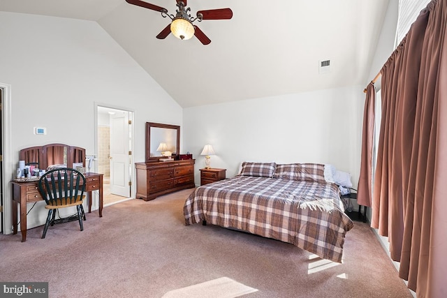 bedroom with visible vents, light colored carpet, and high vaulted ceiling