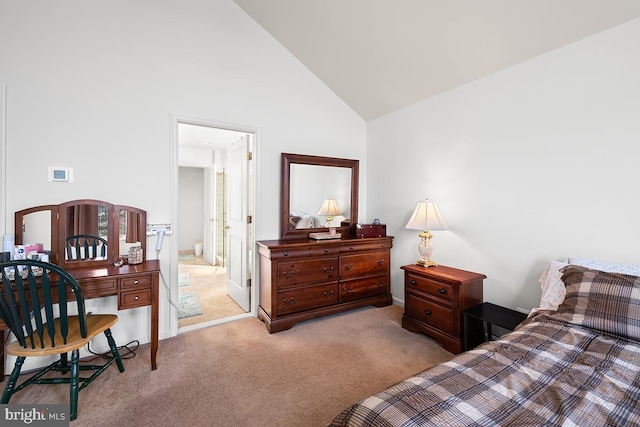 bedroom featuring carpet floors and high vaulted ceiling