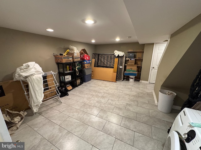 finished below grade area featuring recessed lighting and baseboards