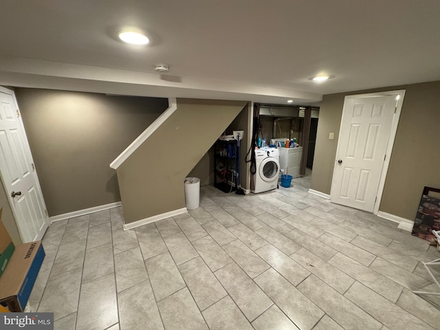 finished below grade area with recessed lighting, washer / clothes dryer, and baseboards