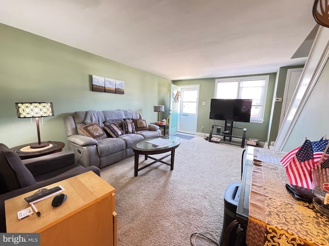 living room featuring carpet