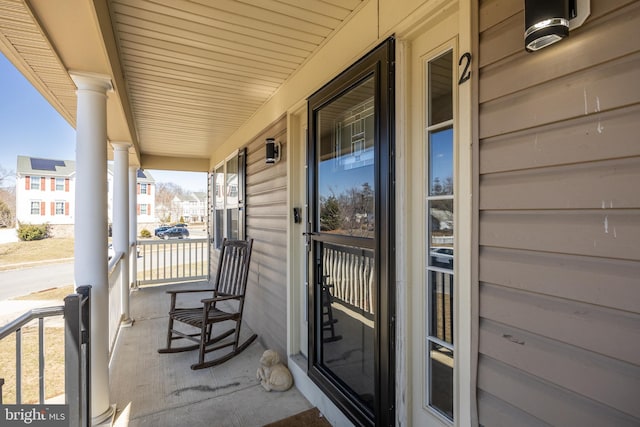 exterior space with a residential view and a porch