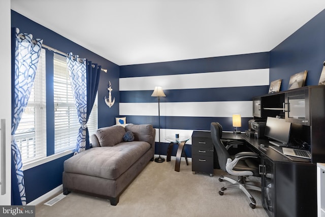 office area featuring visible vents, baseboards, and carpet floors