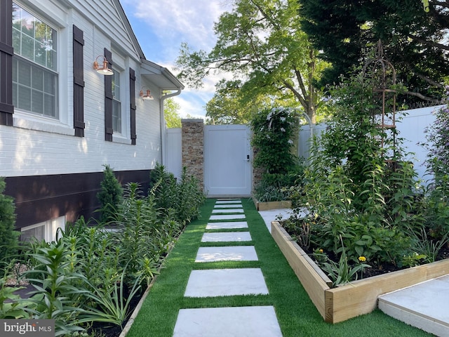 1700 Verbena St NW, Washington, DC 20012 - view of yard featuring a gate, fence, and a vegetable garden