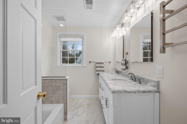 full bathroom with baseboards, visible vents, a sink, a bathtub, and marble finish floor