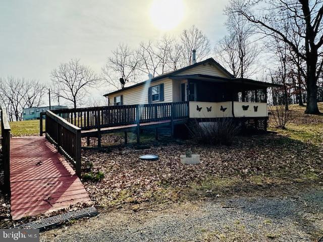 exterior space featuring a wooden deck