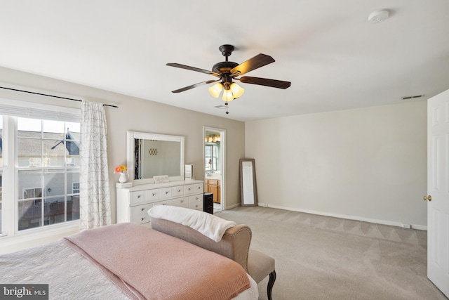 bedroom featuring light carpet, visible vents, ceiling fan, and baseboards