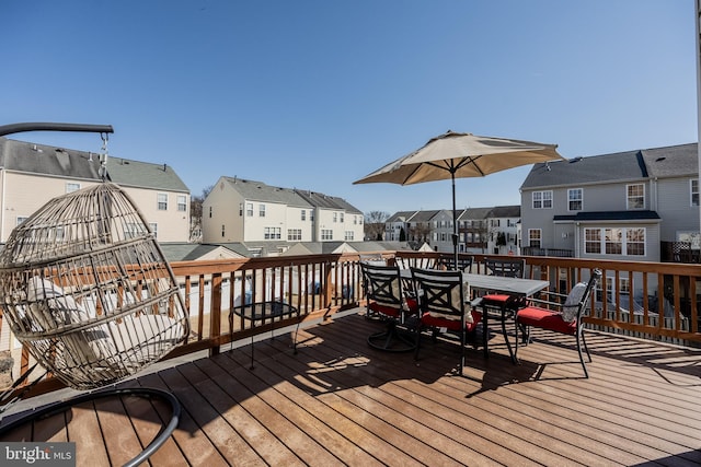 wooden deck featuring a residential view