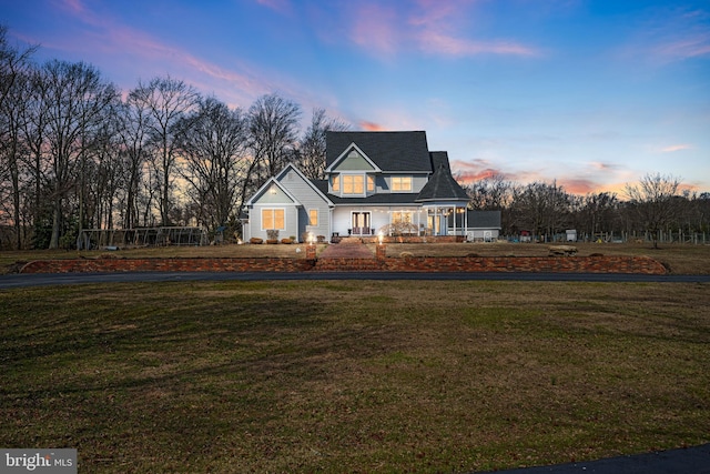 view of front of home with a front lawn