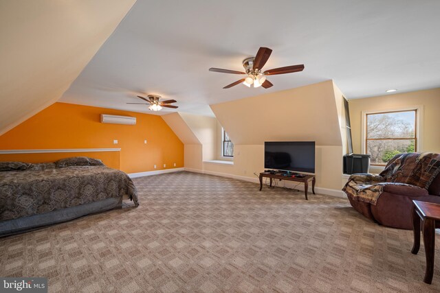 bedroom with baseboards, lofted ceiling, a wall unit AC, and carpet floors