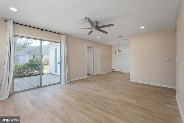 spare room featuring baseboards, light wood-type flooring, baseboard heating, recessed lighting, and a ceiling fan