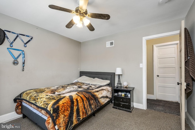 bedroom featuring visible vents, ceiling fan, baseboards, and carpet floors